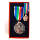 A silver Maritime Service medal, boxed, together with a miniature version