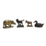 An Anglo-Indian brass figure of a rhino, 7cmL; together with a bronze duck, 6cmL; donkey and one