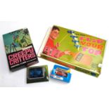 A Toltoy creepy critters game together with a flip your top game, a boxed Matchbox BMW Cabriolet and