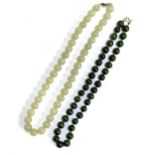 A Chinese pale green jade bead necklace, each bead approx. 0.8cmD, overall 44.5cmL; together with