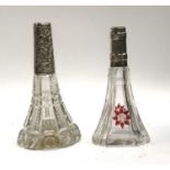 Two silver collared cut glass scent bottles, the tallest 14.5cmH