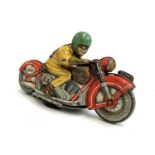 A Schuco tin plate clockwork Moto-Drill 1006 motorcycle and rider, no key, approx. 12.5cmL