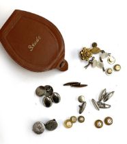 A quantity of cufflinks and studs to include a pair of mother of pearl and black enamel studs