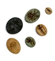 Six unmounted intaglios, the largest 2.4x2cm