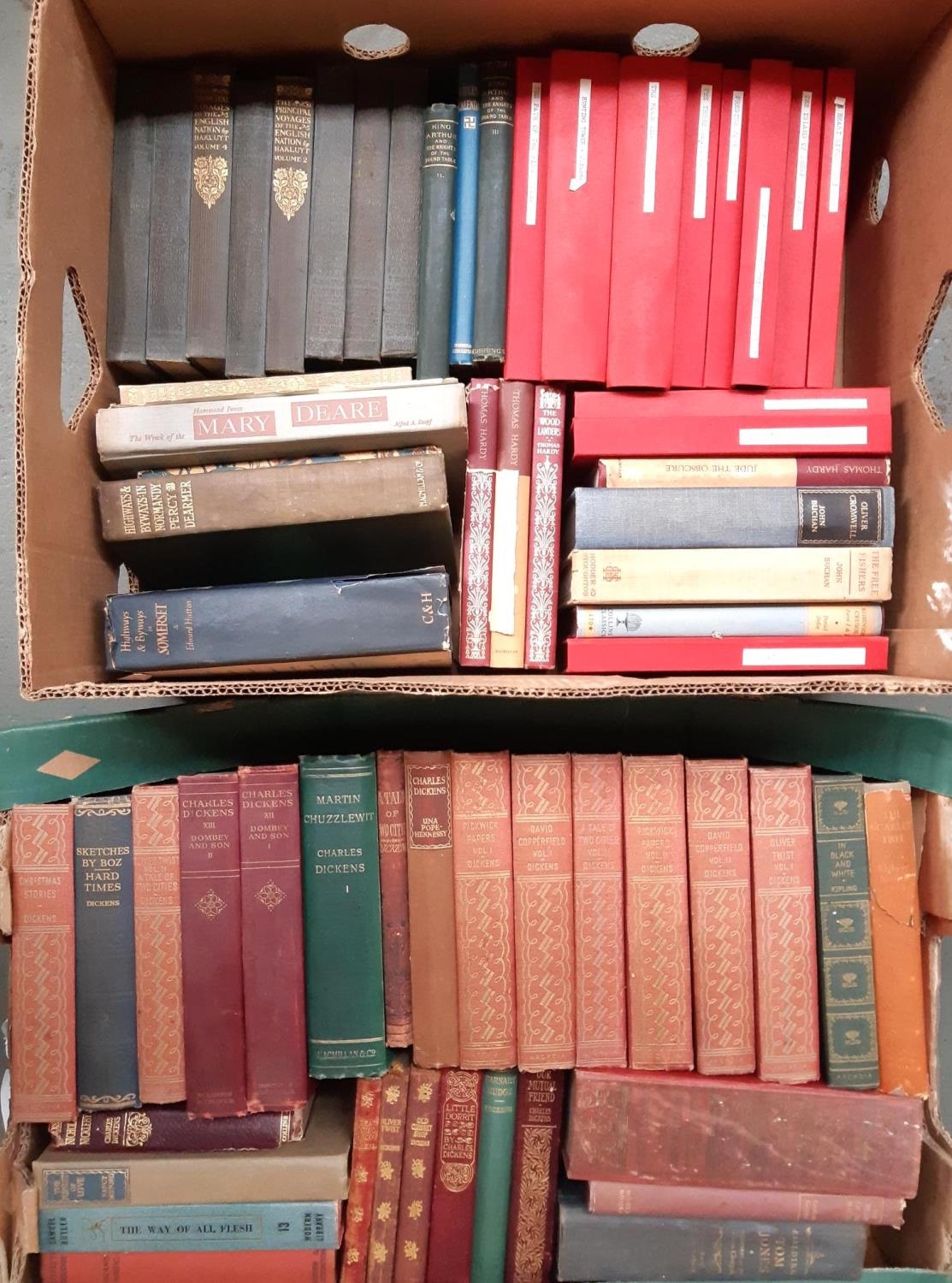 Two mixed boxes of hardback books to include Dickens, J Buchan, Daniel Defoe, Thomas Hardy, etc