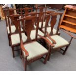 A set of eight 20th century vase splat dining chairs by Pilgrim with drop-in seats, two carvers