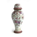 A small Chinese famille rose baluster lidded vase, holes drilled for lamp conversion, 20cmH