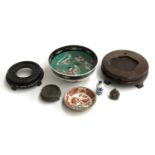 A mixed lot of Oriental items, to include snuff bottle, resin buddha, hardwood stands, bowl, etc