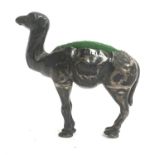 A silver pincushion in the form of a camel, hallmarked RP, date marks rubbed