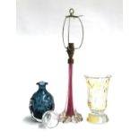 A cranberry glass table lamp, height to base of fitting 27cmL; yellow bohemian cut glass vase; small
