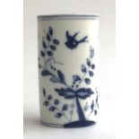 A blue and white cylindrical Chinese brush pot, depicting a bird in flight, 10.5cmH