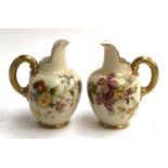 A pair of Royal Worcester blush ivory jugs numbered 1094, 10.5cmH, one with repairs