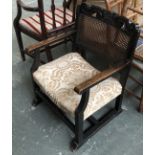 A 20th century oak and caned bedroom chair