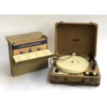 A Champion portable record player together with a cased set of linguaphone 78s