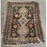 A Persian tribal rug, approx. 168x129cm