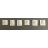 A set of six mounted modern plaster plaques of classical rulers