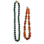 A carnelian and white metal bead necklace, with a 925 silver clasp, 42cmL unclasped; together with a