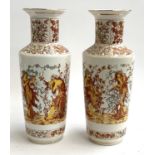 A pair of Italian vases decorated with scenes of Mucha's seasons, 35.5cmH