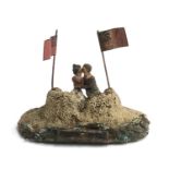 A late 19th/early 20th century handmade diorama depicting lovers embracing beneath two Royal Navy