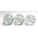 Three large art glass orb paperweights, each approx. 12.5cmD