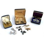 A mixed of cufflinks to include Wedgwood jasperware, silver cufflinks, tie clips, Ford Model T