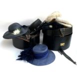 Two vintage hat boxes containing a quantity of hats, to include two ladies Kangol hats, Bermona