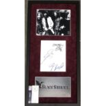 A framed and glazed Black Sabbath autograph set bearing the autographs of Ozzy Osbourne, Tony