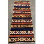 A Kilim rug, approx 233x97cm
