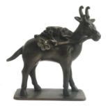 A bronze incense holder in the form of a goat chewing a prunus branch, 15cmH