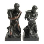 Two Staffordshire figures of a merman in a dark treacle glaze (af), 24cmH and 22.5cmH