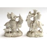 A pair of Staffordshire figures (af), unpainted and unglazed, Count Bruhl's Tailor and his Wife,