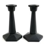 A pair of black basalt style frosted glass hexagonal candlesticks, tapered columns, 19cmH