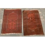 A pair of red ground prayer rugs, each approx. 101x75cm