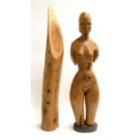 A carved pine sculpture of a lady, together with one other yew wood sculpture titled 'Form in