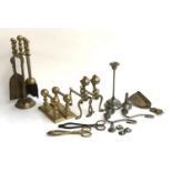 A small lot to include fire furniture, two pairs of small brass tongs, candlestick remnants etc