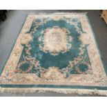 A very large Chinese wool rug, approx 370x282cm