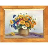 A 20th century still life of flowers, oil on canvas, signed lower right, 24x32cm