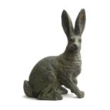 A heavy patinated bronze sculpture of a hare, 32cmH
