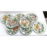 Eight Limoges for Thomas Goode London hand painted plates, botanical designs, three painted by G