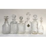 Five cut glass decanters, the tallest 28cmH, one Webb Corbett, another engraved 'Wildernesse 1987-