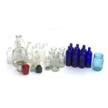 Flower arranging interest: a small lot of vintage and other glass bottles to include Neals Yard