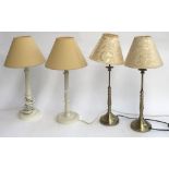 A pair of painted turned wood table lamps, 52cmH to top of shade; together with a pair fo brushed