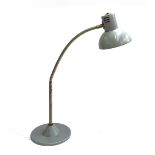 A vintage industrial large opposable lamp, stamped 'Made in Poland'