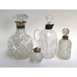 A late Victorian cut glass liqueur decanters, silver collar marked for Chester 1898, 21cmH; cut