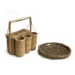 A wicker picnic basket with three bottle holders; together with a wicker dish, 40cmD