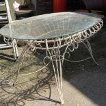 A metal garden table with glass top, 143x105x76cmH