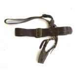 A Sam Browne leather holster