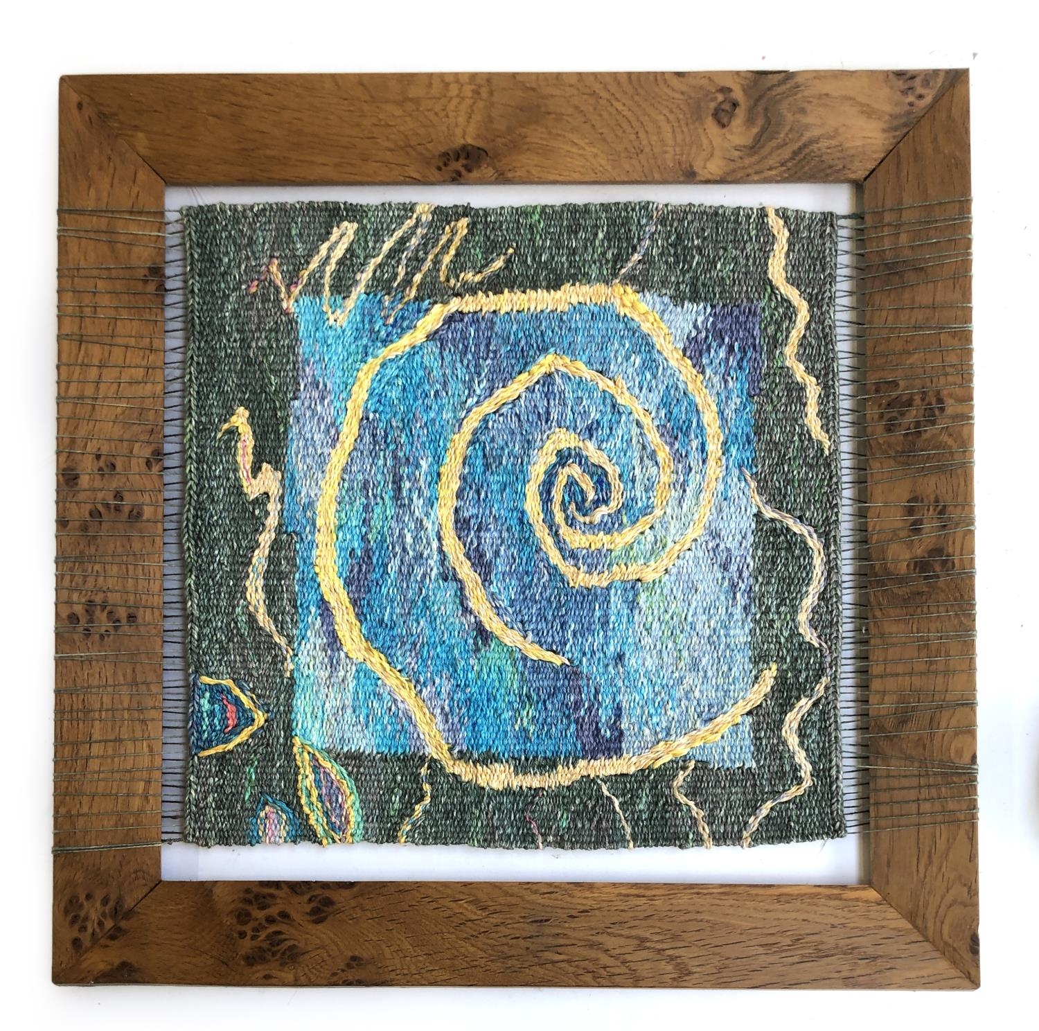 Jacy Wall (20th century British) tapestry, 'Ammonite', dated 1993, 33x33cm