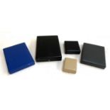 A quantity of leather jewellery presentation boxes, the largest 30x22cm