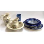 A floral wash bowl and two jugs, the tallest 29cmH, together with a pair of blue and white fruit